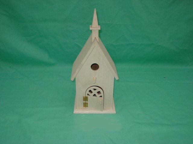 Church-style wooden bird house with spire, arched half-door and side window