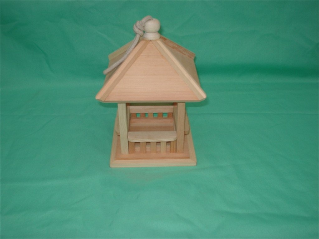 Pagoda-style wooden bird feeder with two-tier pagoda roof, rope hanger and post-and-rail sides