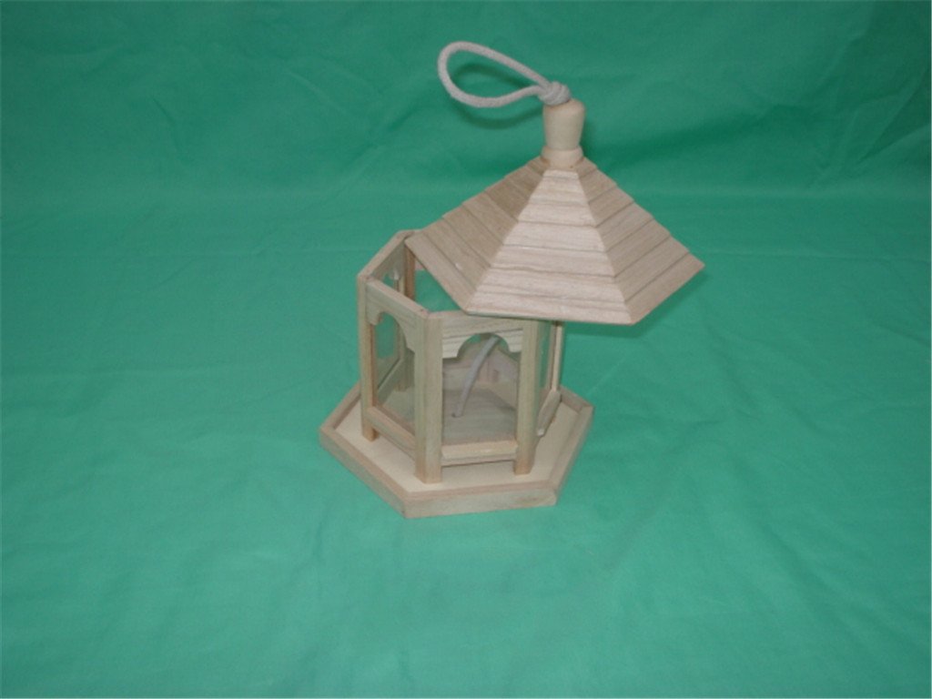 Hexagonal wooden bird feeder with tall pagoda roof, rope hanger, arched openings and finial