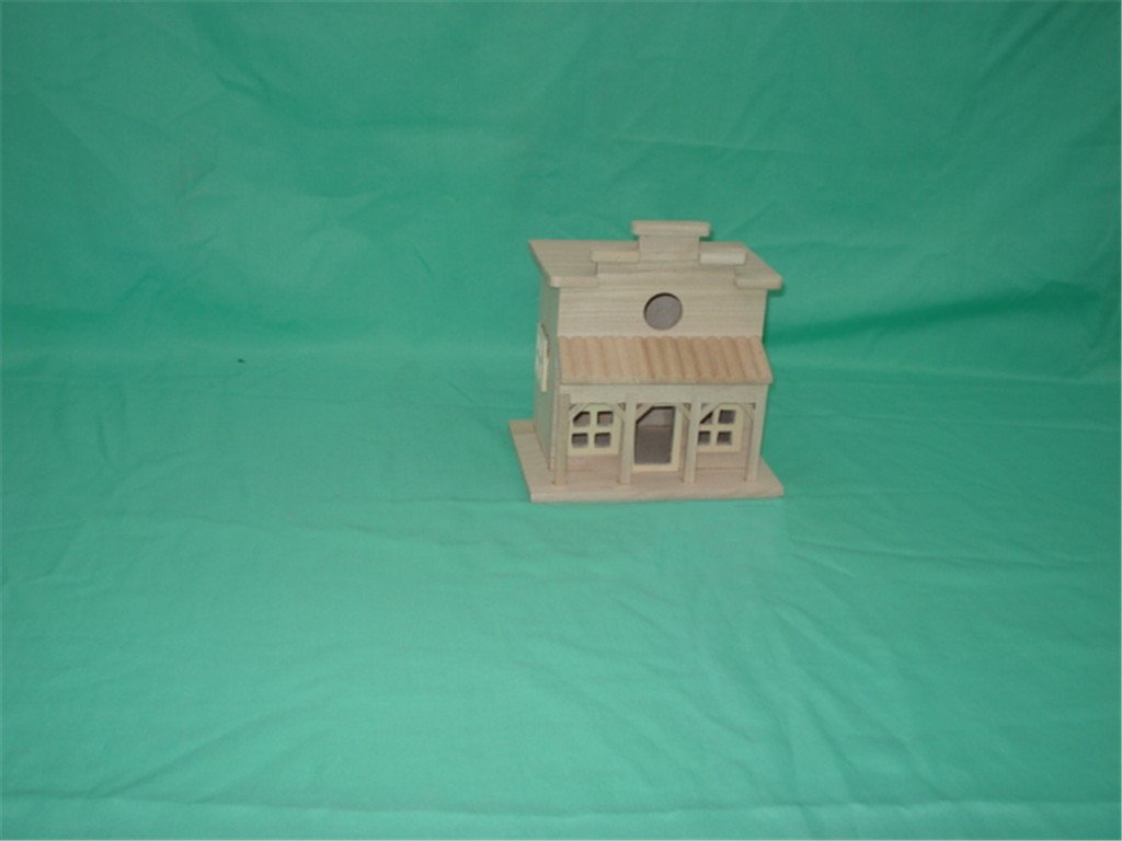 Western two-story saloon-style wooden bird house with false front, porches, windows and door