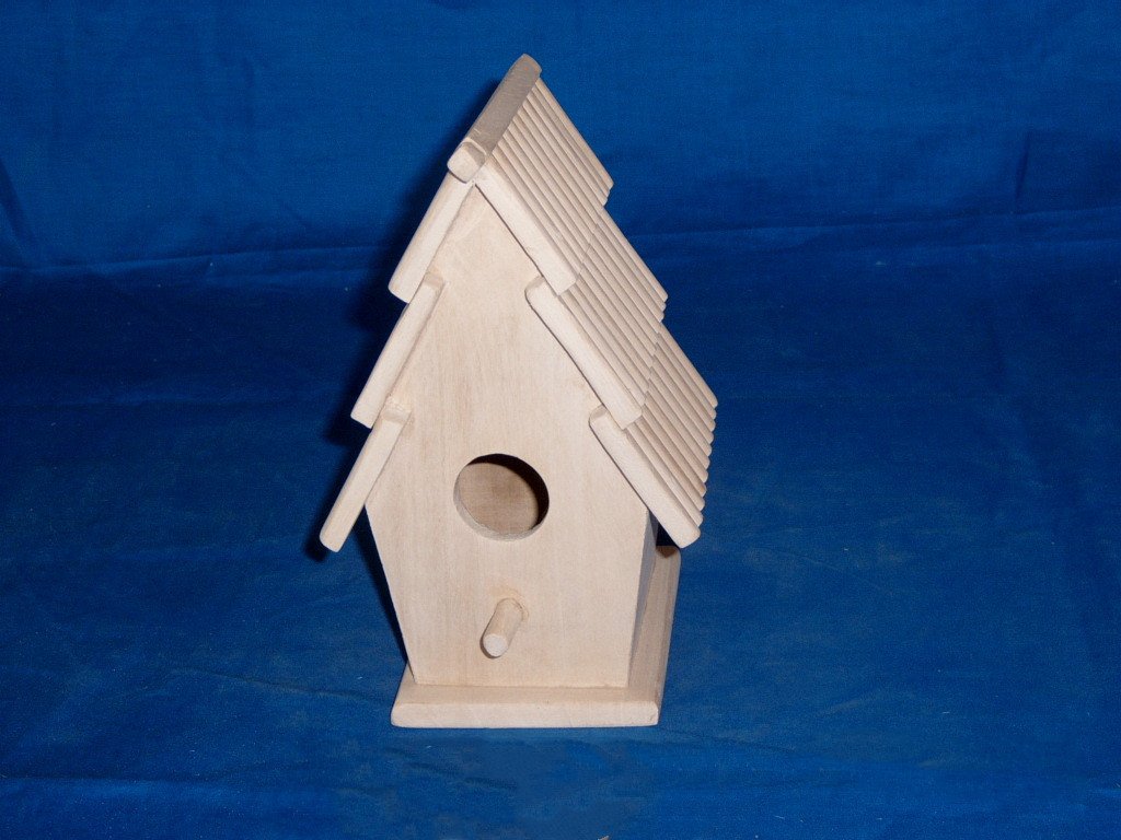A-frame wooden bird house with ridged roof tiles, circular entrance hole and perch