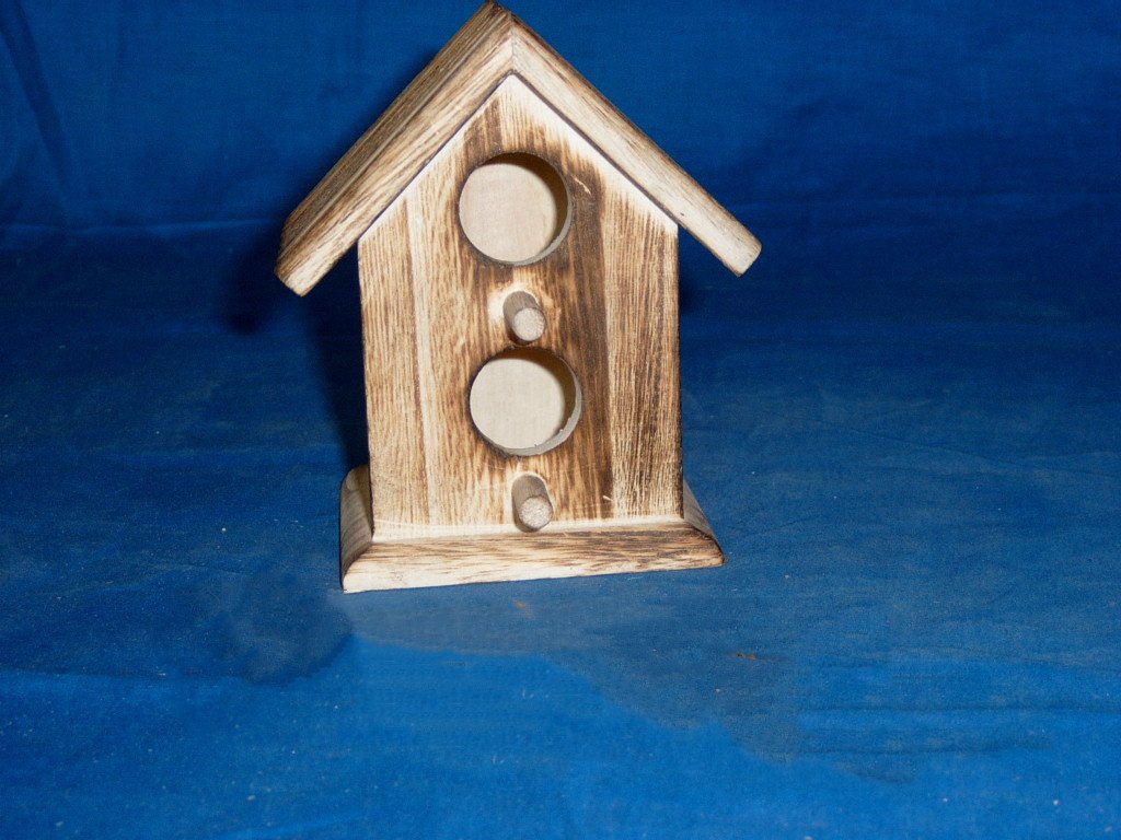 Double-entrance wooden bird house in driftwood finish with two stacked round entrances and perches