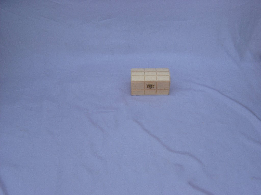 Tiny square wooden box with 3x2 grid inlay banding pattern and small silver latch