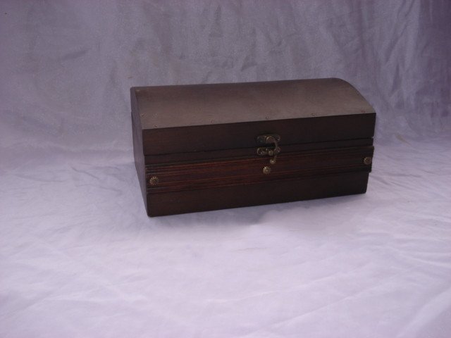 Dark brown domed wooden jewelry-style box with two-tier drawer and small brass clasp