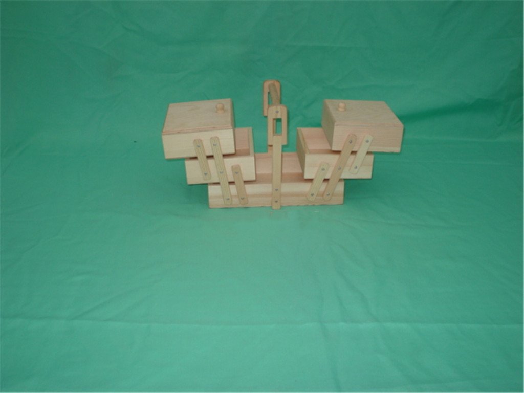 Puzzle-style wooden jewelry box with three layers, six hinged compartments and central carry handle