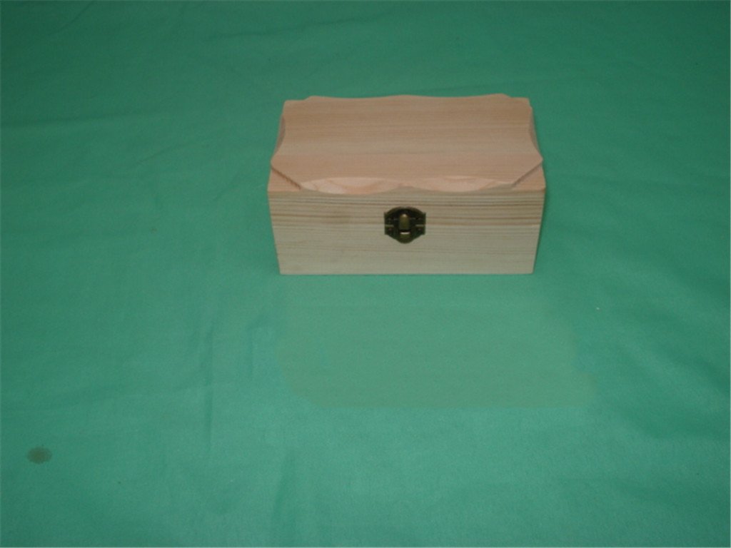 Rectangular natural-pine wooden box with concave arched lid and brass latch