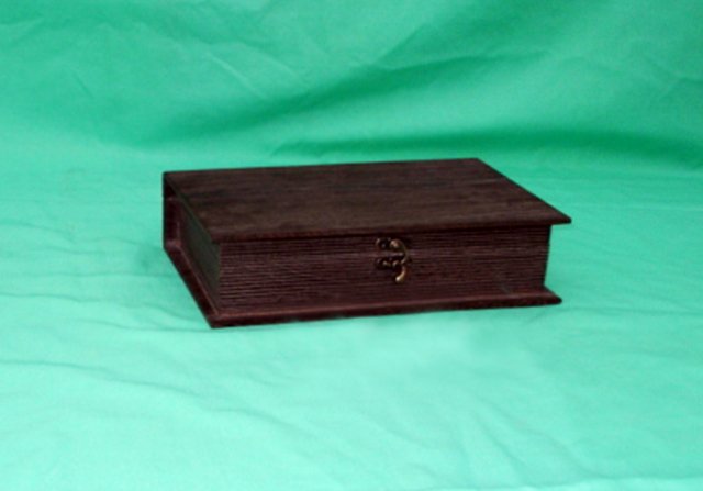 Small dark rosewood hinged wooden box with reeded side panels and brass latch