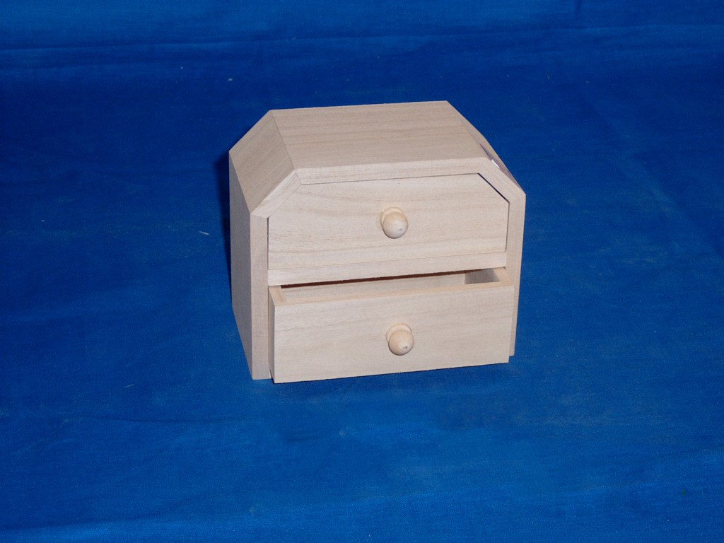 Small natural-pine two-drawer chest with round wooden knobs and octagonal top corners