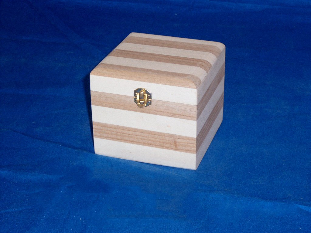 Square wooden box in alternating horizontal two-tone stripe pattern, brass latch