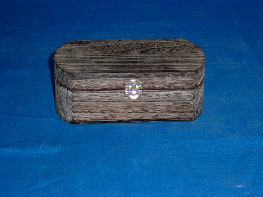 Oval elongated domed driftwood-stained wooden box with brass latch