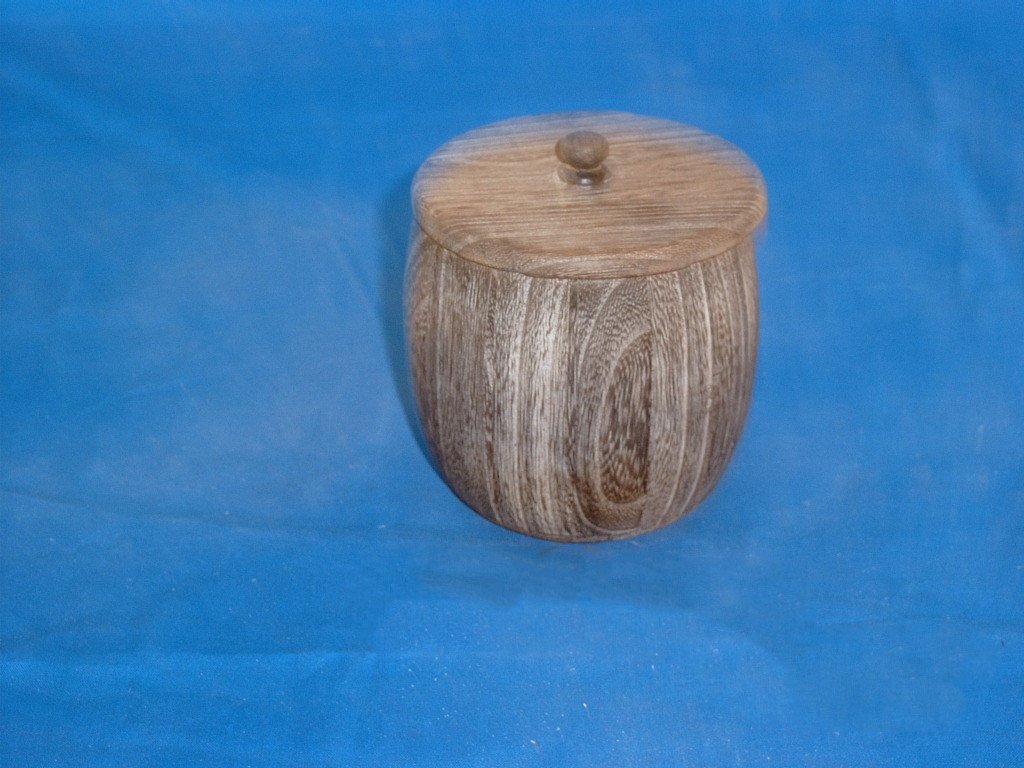 Small round natural-wood barrel-shaped wooden box with small round wooden knob lid