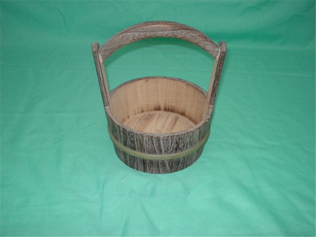 Round natural-wood bucket-style flower pot with arched handle and bamboo band