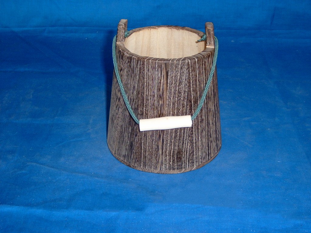 Tapered dark-stained wooden flower pot with rope handle and natural wood grip