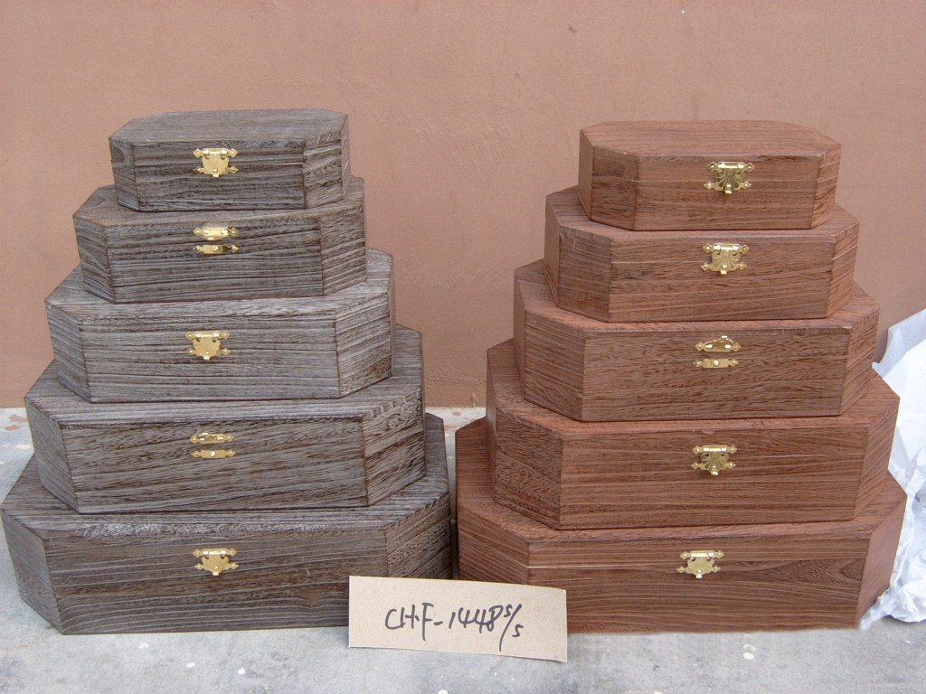 Five-step rectangular wooden storage chest set in two finishes with brass latches