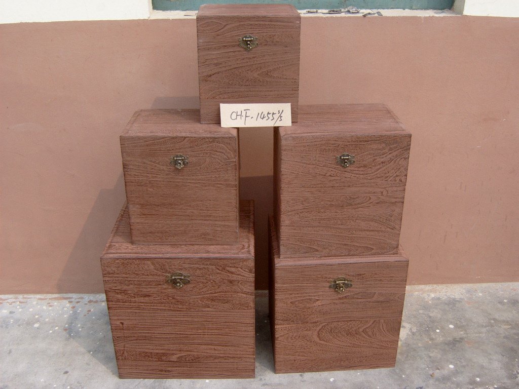 Five-piece medium-brown square wooden storage chest set with brass latches, taller design
