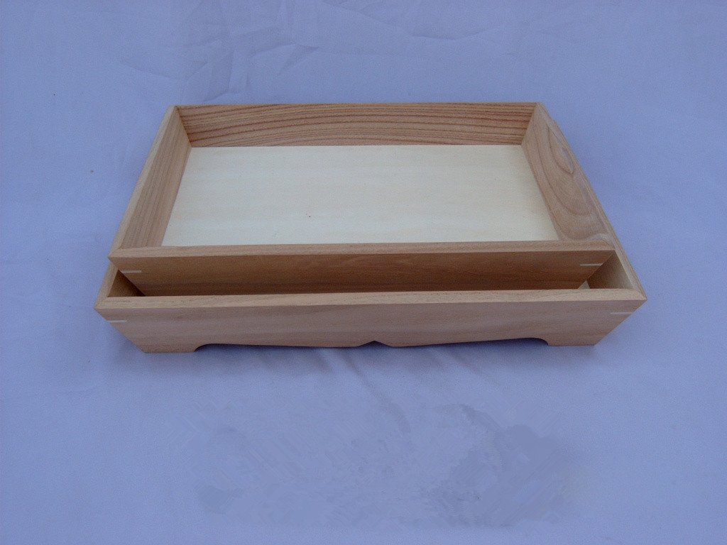 Set of two rectangular wooden serving trays with lid and decorative footed base with scalloped edge