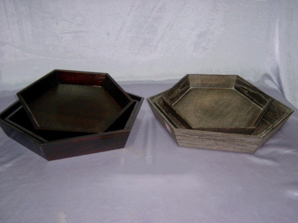 Two sets of two octagonal wooden serving trays in dark red mahogany and dark grey finishes