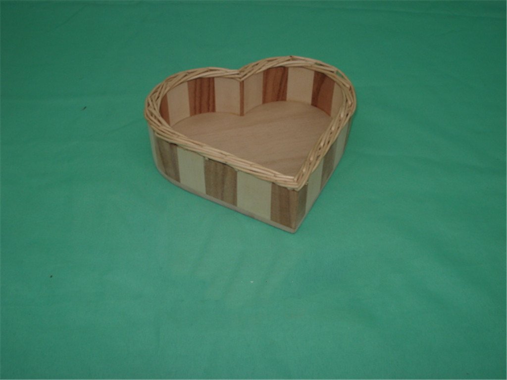 Heart-shaped wooden basket with two-tone wood stripe sides and woven rattan top trim