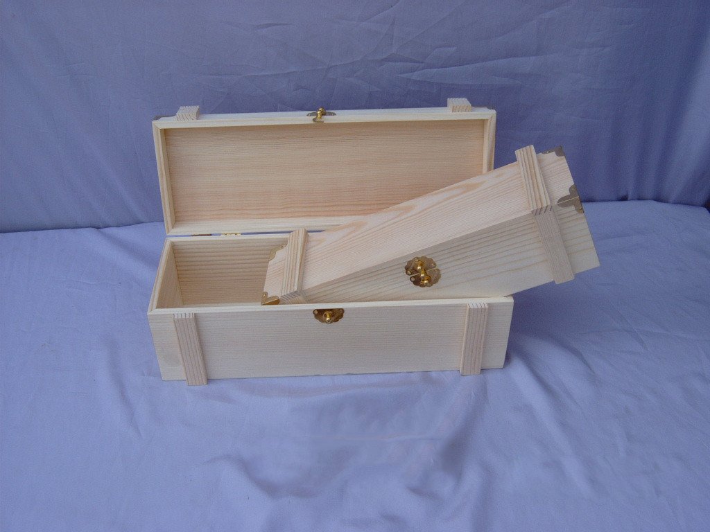 Two open natural-pine hinged wooden wine boxes with sliding internal dividers and brass latches