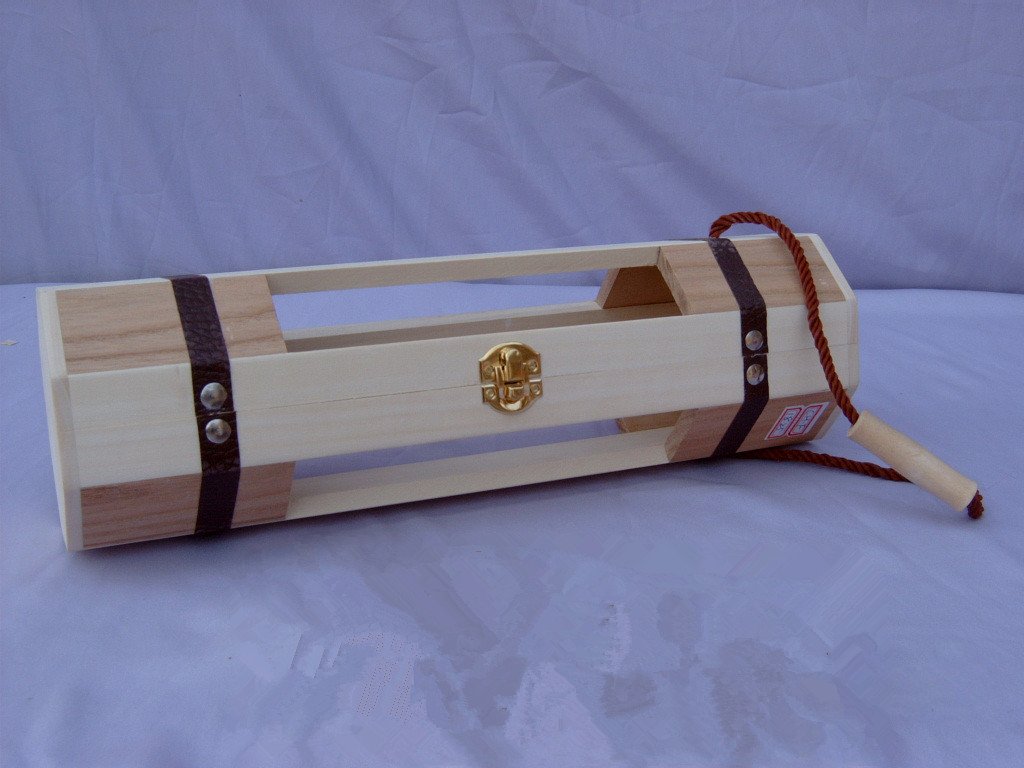 Cylindrical two-tone striped wooden wine carrier cage with open rails, brass center clasp and leather rope handle