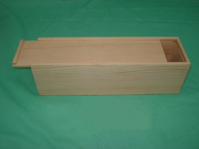 Long flat natural-pine wooden wine box with sliding lid and internal divider slot