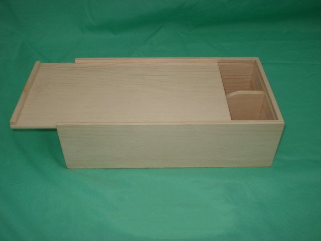 Long flat natural-pine wooden wine box with sliding lid and internal bottle divider panel