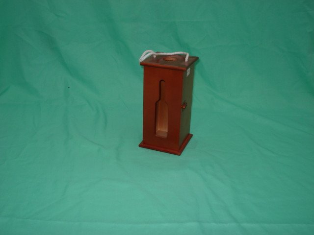 Tall narrow rectangular dark red lacquered single-bottle wooden wine box with white rope top handle, bottle window and brass latch