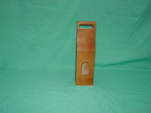 Tall narrow tan / orange stained single-bottle wooden wine box with side finger hole and arched cutout handle on top